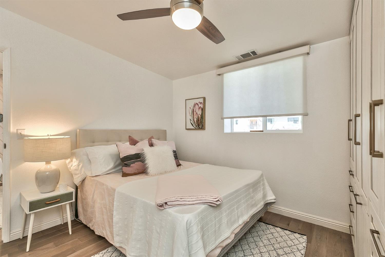 668 Spring Street Oak View, CA 93022 - Photo 14 of 24 a bedroom with a bed and a window