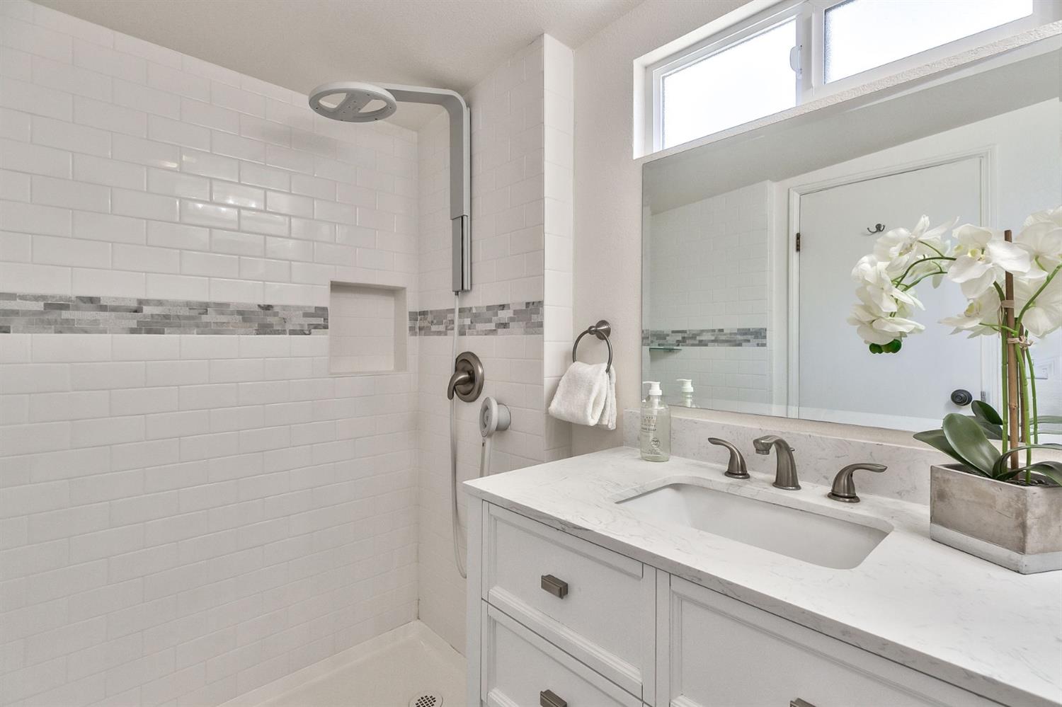 668 Spring Street Oak View, CA 93022 - Photo 17 of 24 a bathroom with a sink and a mirror