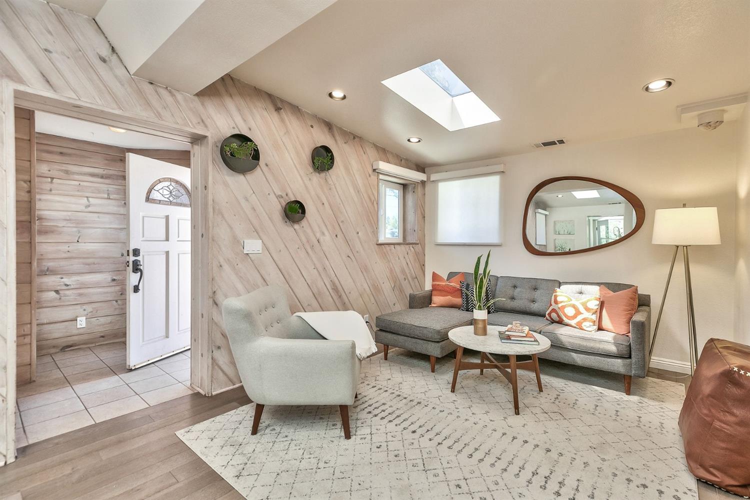 668 Spring Street Oak View, CA 93022 - Photo 6 of 24 a living room with furniture and a mirror