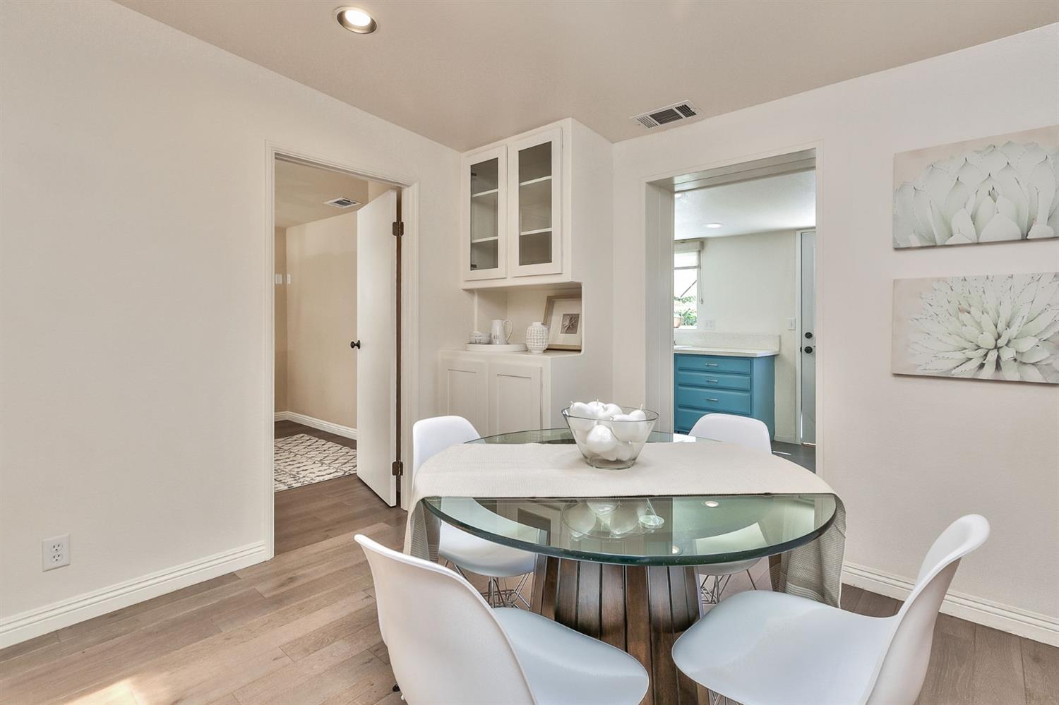 668 Spring Street Oak View, CA 93022 - Photo 10 of 24 a view of a dining room with furniture and wooden floor