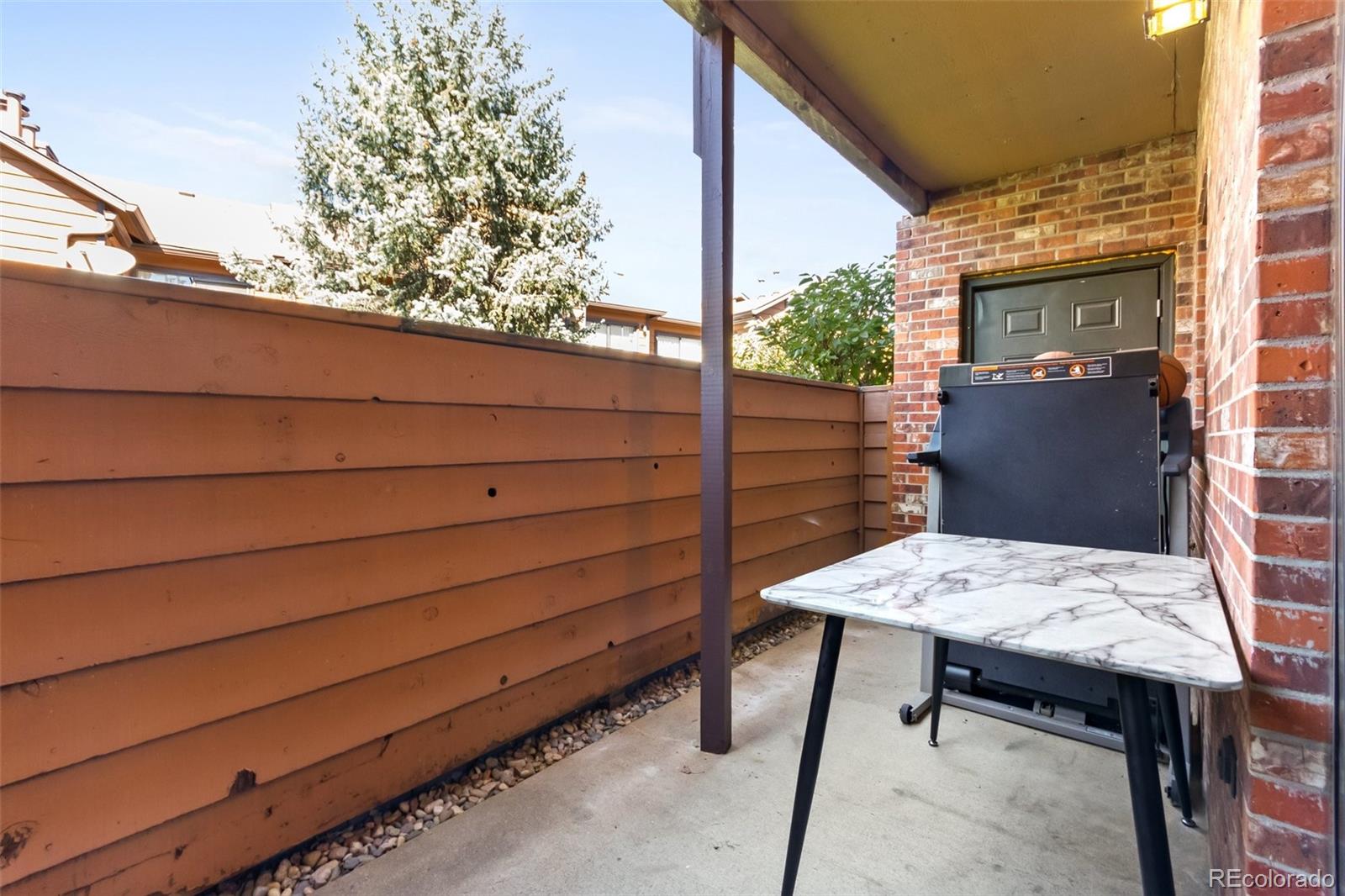 2265 South Buckley Road, Unit 102 Aurora, CO 80013 - Photo 17 of 28 a view of a outdoor seating area