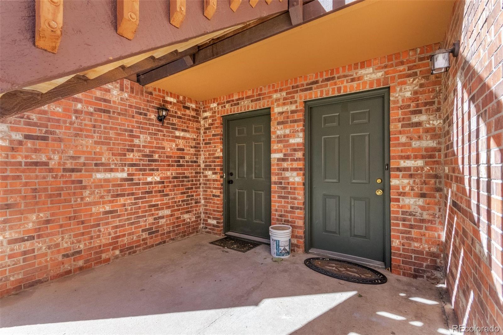 2265 South Buckley Road, Unit 102 Aurora, CO 80013 - Photo 5 of 28 a view of front door of house
