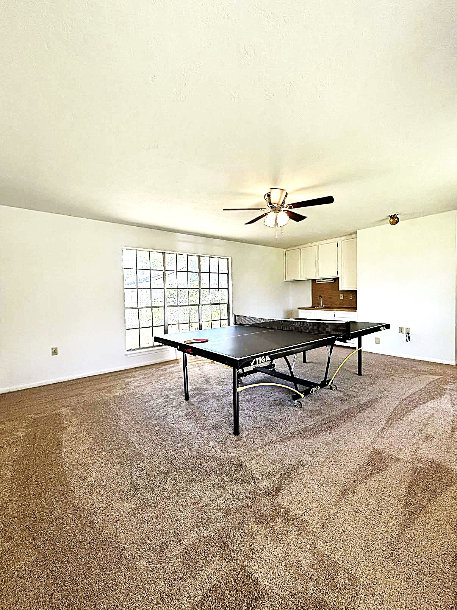 101 Summit Drive Conroe, TX 77303 - Photo 17 of 24 a view of a livingroom with furniture and window