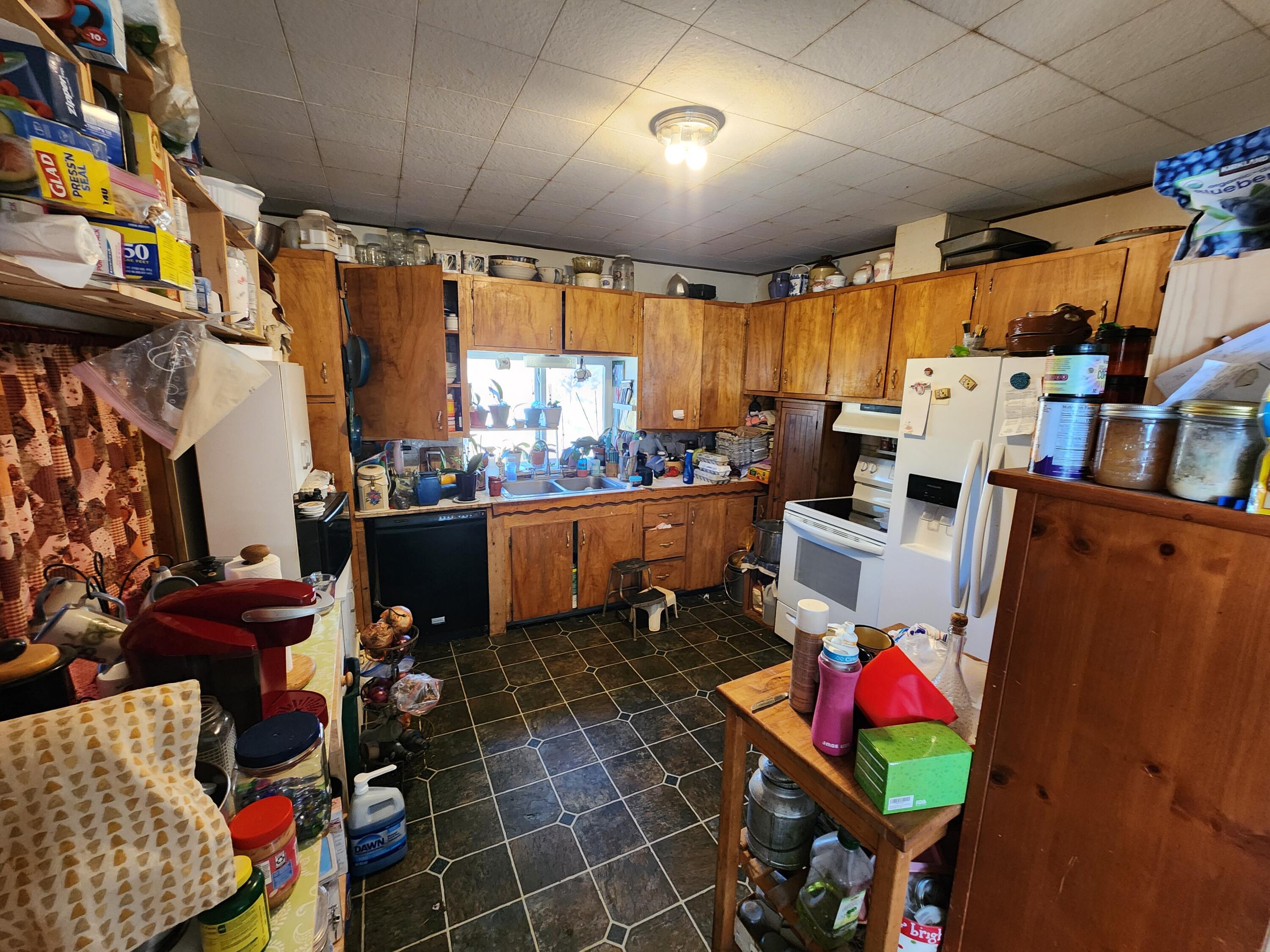 29151 Beatty Drive Beatty, OR 97621 - Photo 12 of 16 a room with lots of storage and a white table