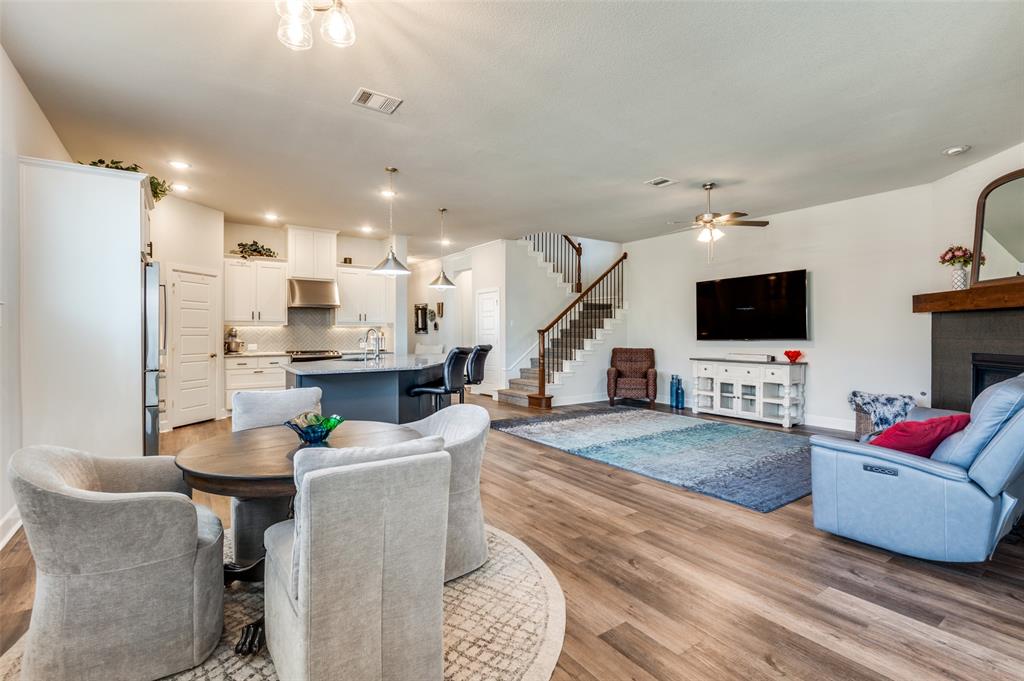 4724 Raspberry Spar Court Arlington, TX 76005 - Photo 14 of 30 a living room with furniture and a flat screen tv
