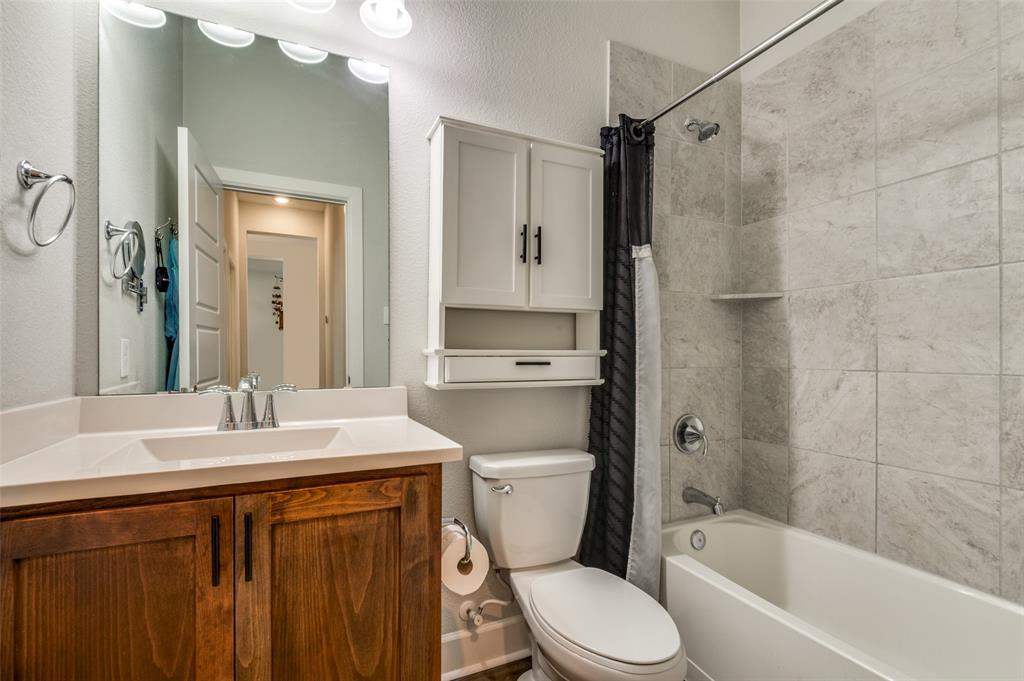 4724 Raspberry Spar Court Arlington, TX 76005 - Photo 17 of 30 a bathroom with a sink toilet and shower