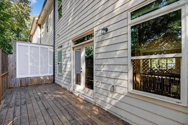 a view of front door of house with wooden floor