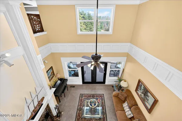 a kitchen with stainless steel appliances granite countertop a refrigerator sink and cabinets