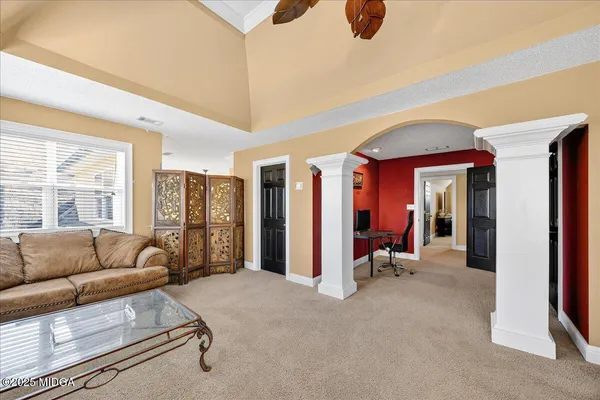 a view of a balcony with chairs