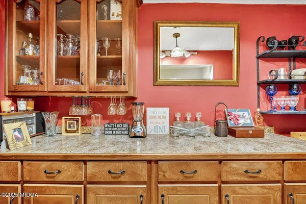 a view of road with large trees