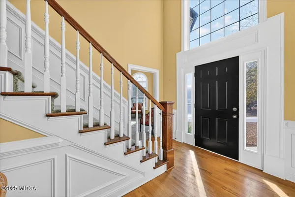 a room with furniture and a large window