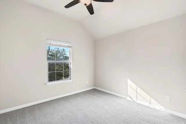 an empty room with a hallway