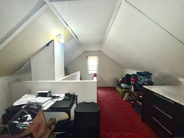 a room with furniture and wooden floor