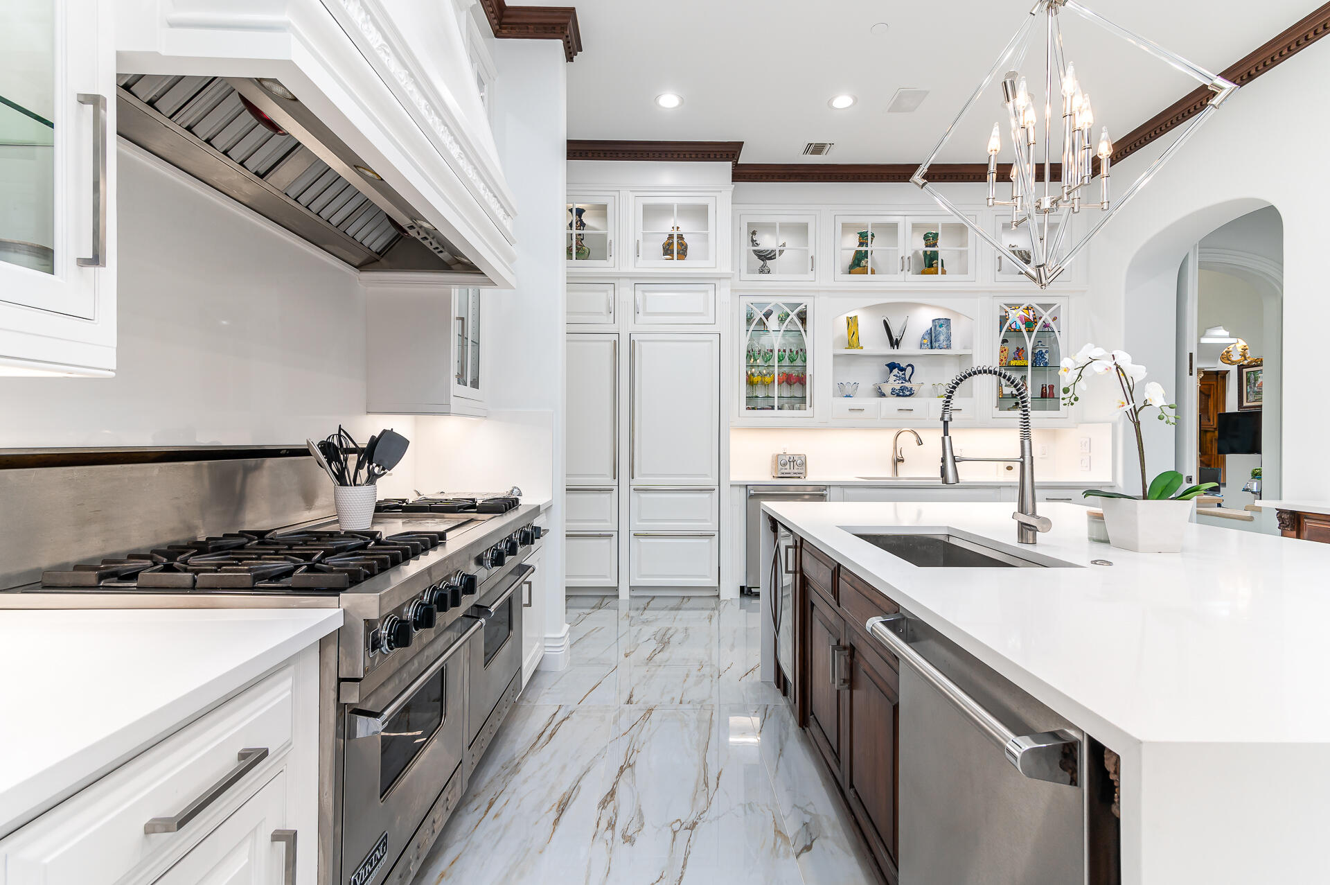 700 Northeast 45th Road Boca Raton, FL 33431 - Photo 13 of 62 a kitchen with stainless steel appliances granite countertop a sink and a stove