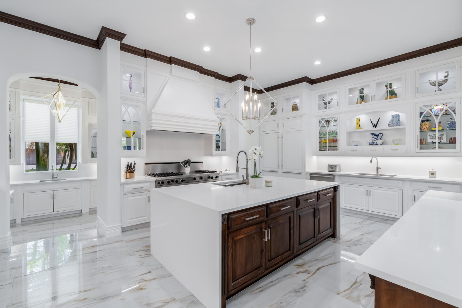 700 Northeast 45th Road Boca Raton, FL 33431 - Photo 14 of 62 a kitchen with a sink stove and cabinets