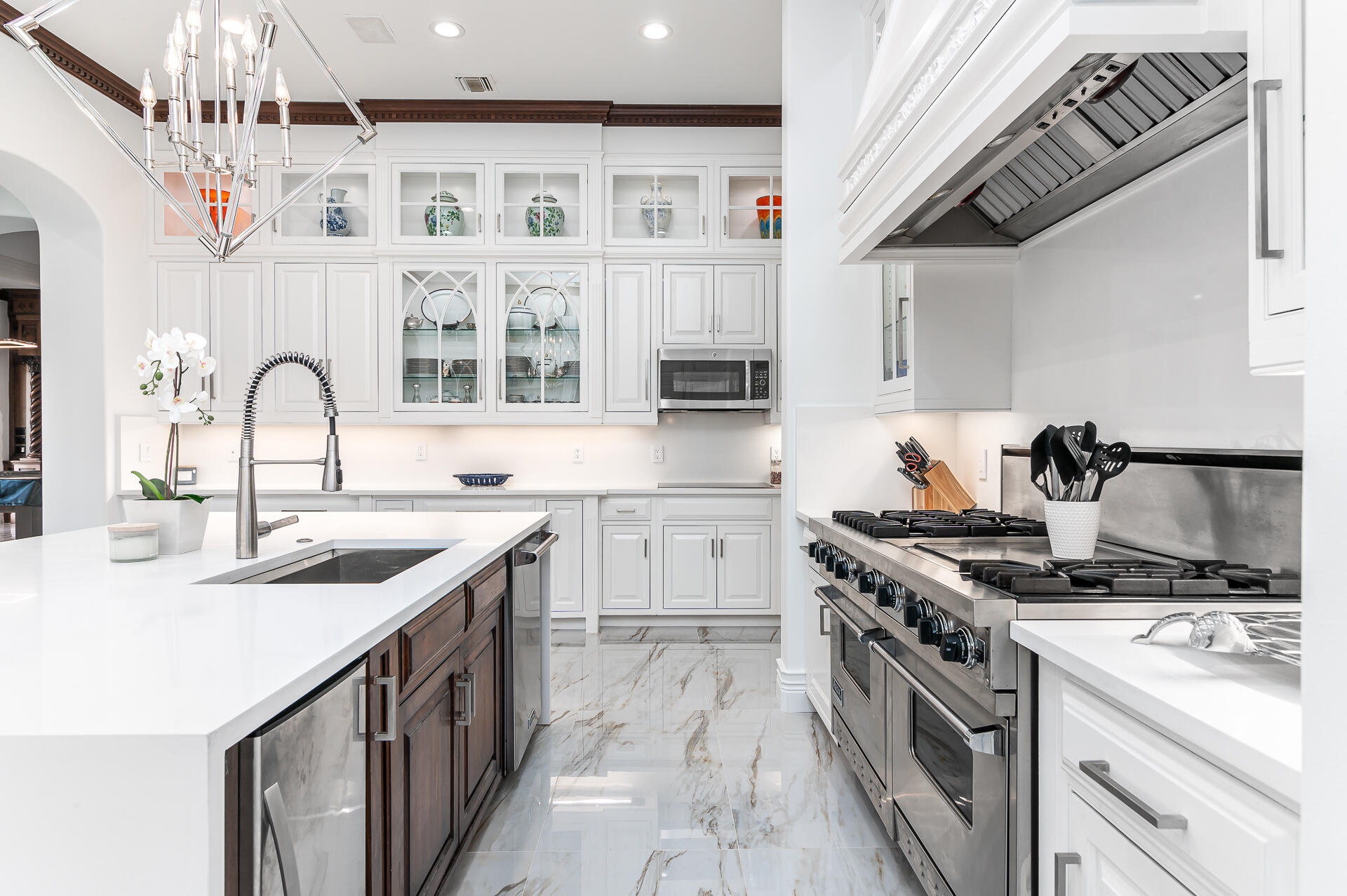 700 Northeast 45th Road Boca Raton, FL 33431 - Photo 15 of 62 a kitchen with stainless steel appliances granite countertop a sink stove and cabinets