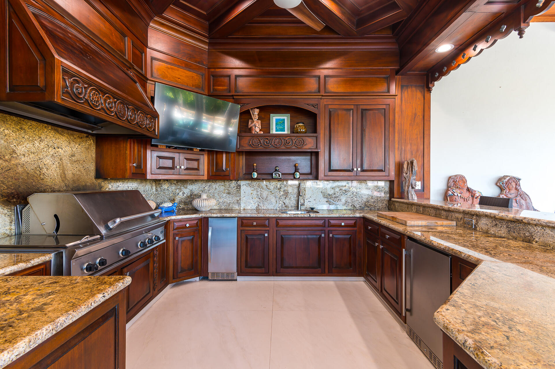 700 Northeast 45th Road Boca Raton, FL 33431 - Photo 23 of 62 a kitchen with stainless steel appliances granite countertop a sink stove and cabinets