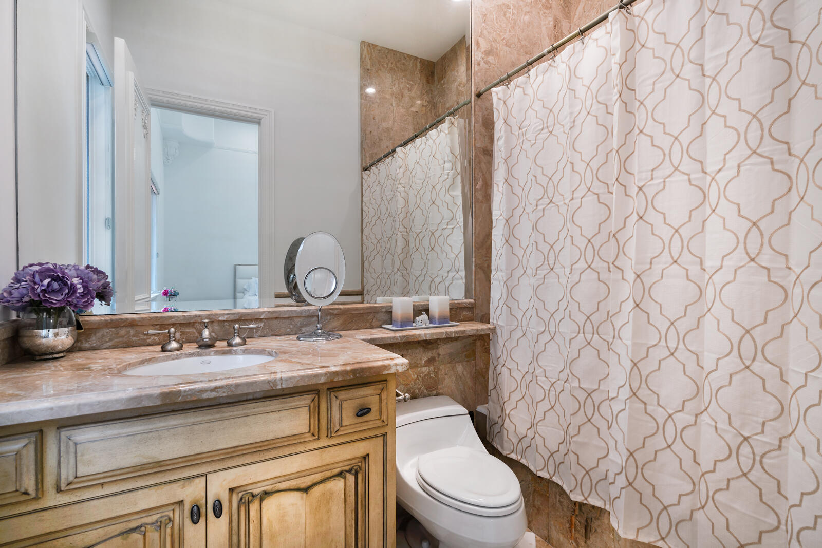 700 Northeast 45th Road Boca Raton, FL 33431 - Photo 43 of 62 a bathroom with a granite countertop sink and a toilet