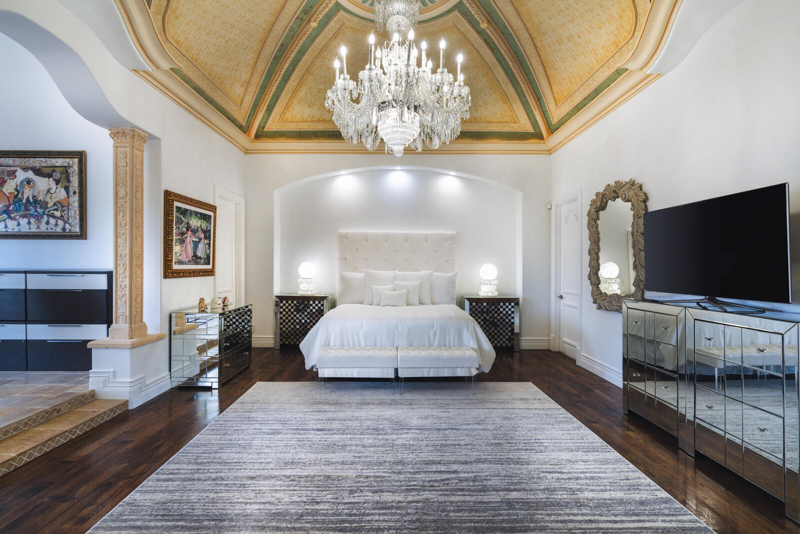 700 Northeast 45th Road Boca Raton, FL 33431 - Photo 44 of 62 a spacious bedroom with furniture and a flat screen tv