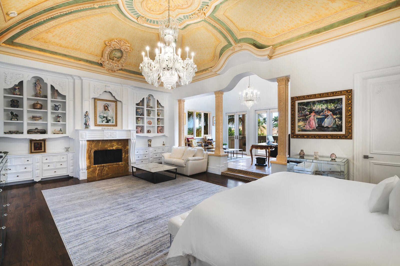 700 Northeast 45th Road Boca Raton, FL 33431 - Photo 45 of 62 a living room with furniture a fireplace and a chandelier