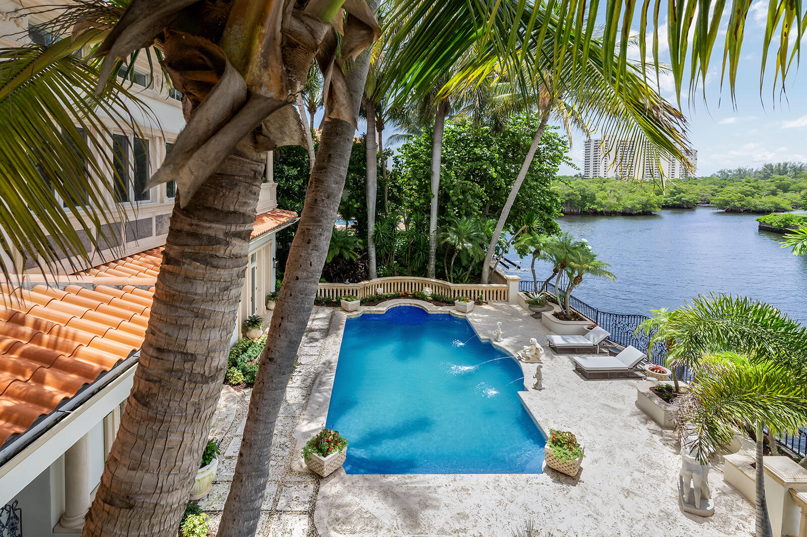 700 Northeast 45th Road Boca Raton, FL 33431 - Photo 48 of 62 a backyard of a house with lots of green space