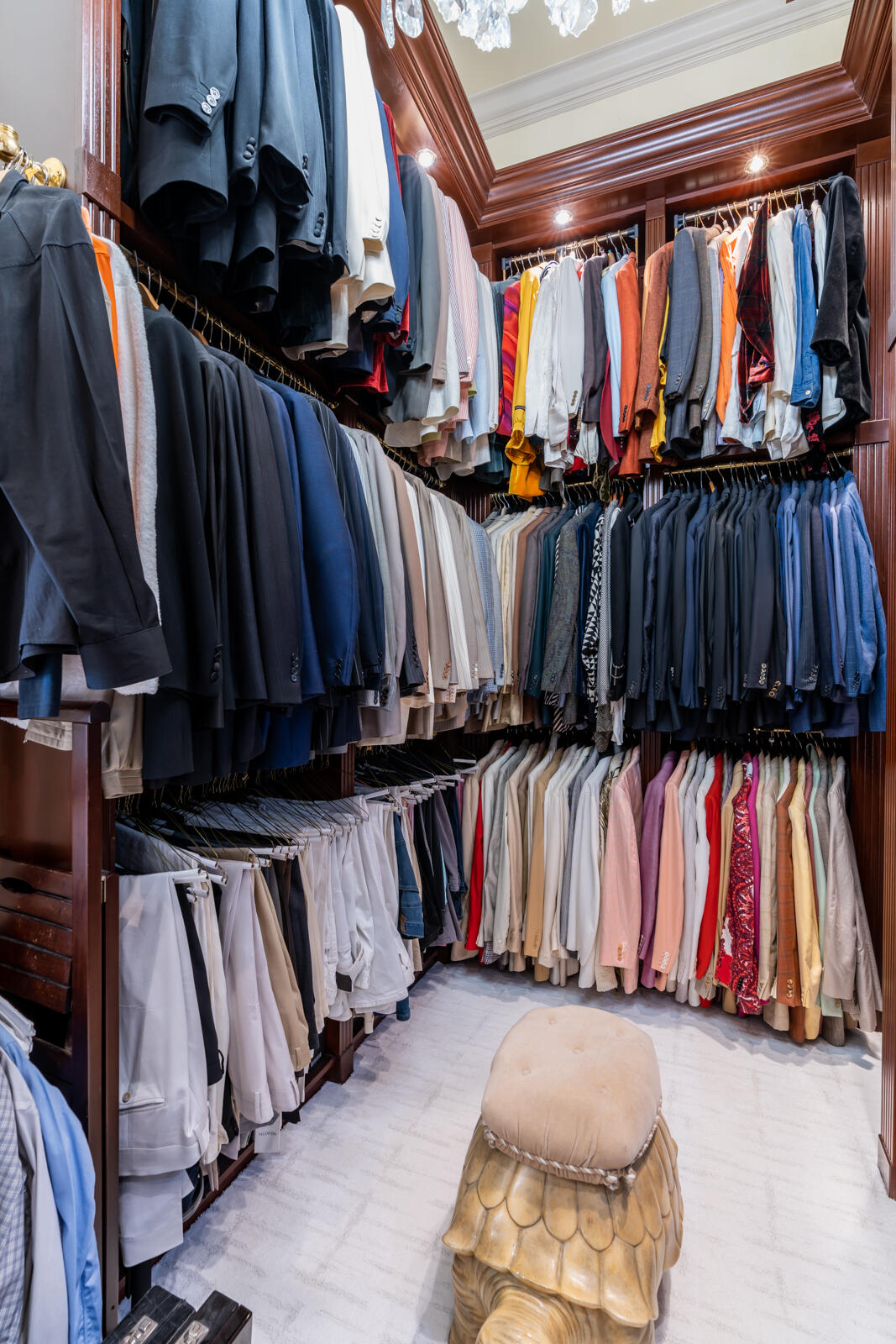 700 Northeast 45th Road Boca Raton, FL 33431 - Photo 52 of 62 a view of walk in closet with clothes and shoes