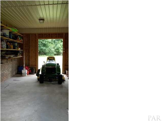 5462 Pine Barron Road Milton, FL 32570 - Photo 17 of 24 Storage Area of Workshop/Garage