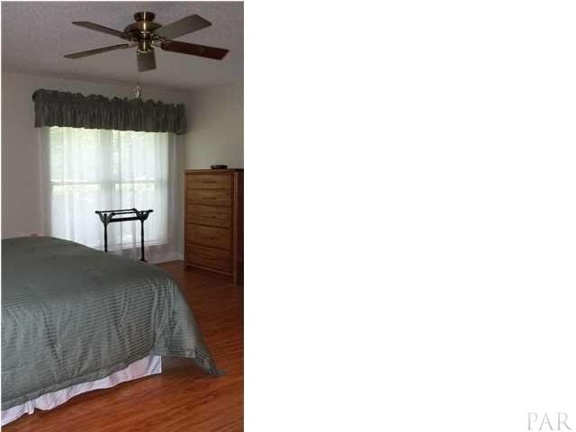 5462 Pine Barron Road Milton, FL 32570 - Photo 20 of 24 Master Bedroom