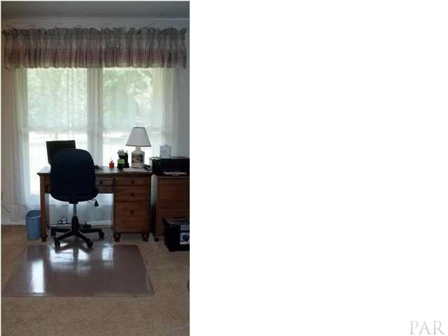 5462 Pine Barron Road Milton, FL 32570 - Photo 22 of 24 Bedroom 3 - Has computer/dressing area and walkin closet.