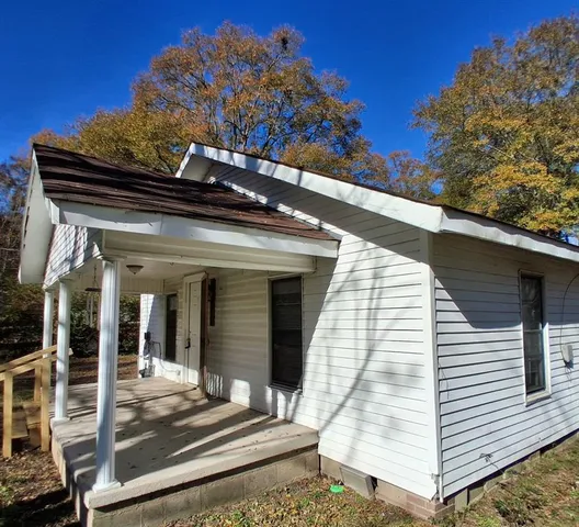 a view of a house with a small porch