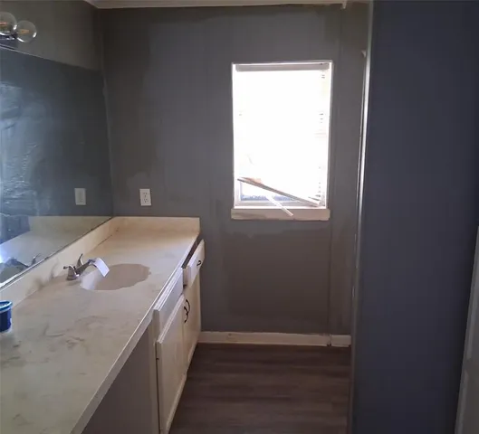 a hallway with washer and dryer