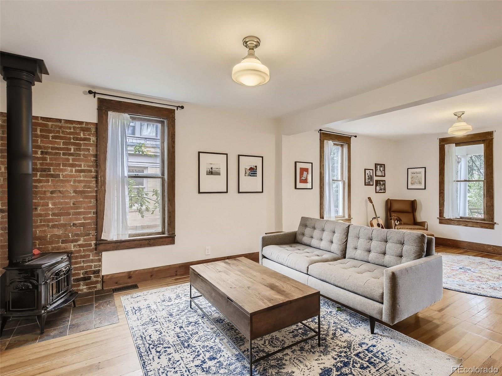 743 9th Street Boulder, CO 80302 - Photo 14 of 28 a living room with furniture and a window