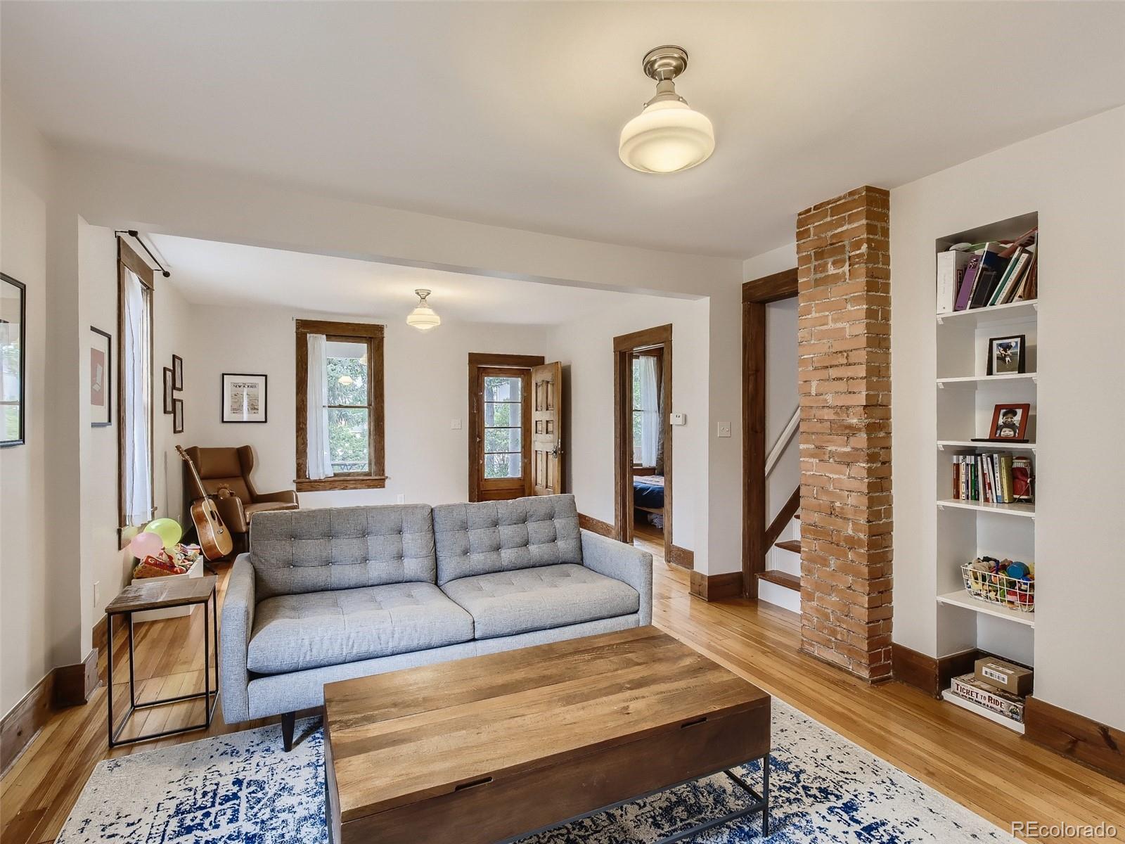 743 9th Street Boulder, CO 80302 - Photo 15 of 28 a living room with furniture and a couch