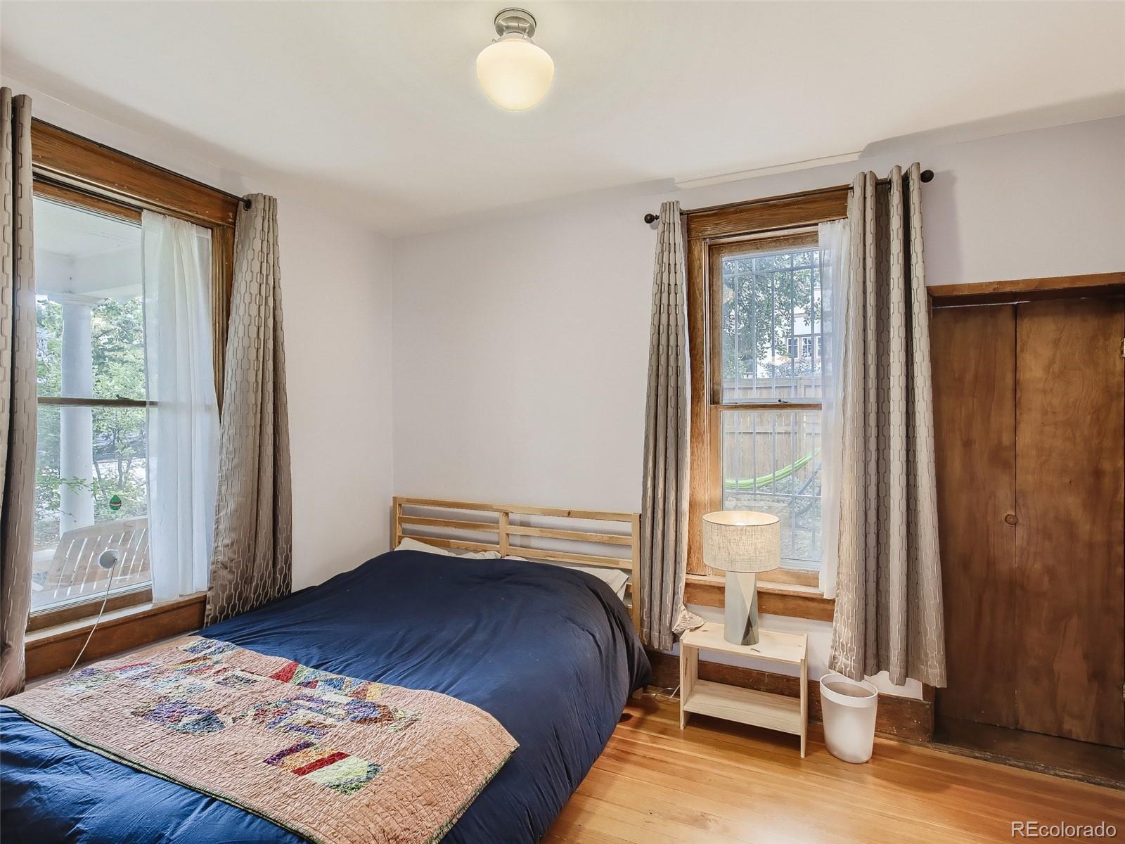 743 9th Street Boulder, CO 80302 - Photo 16 of 28 a bedroom with a bed and a window