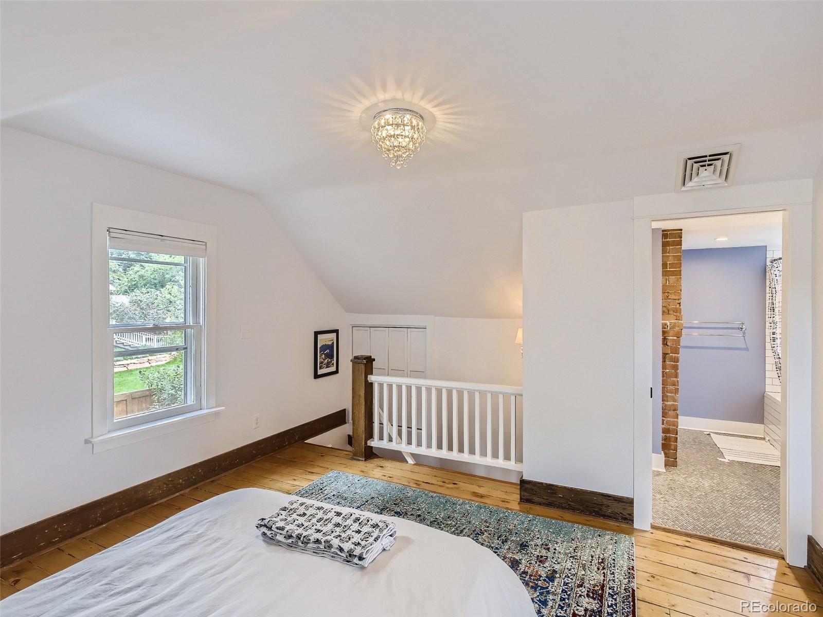 743 9th Street Boulder, CO 80302 - Photo 19 of 28 a view of livingroom with furniture and wooden floor