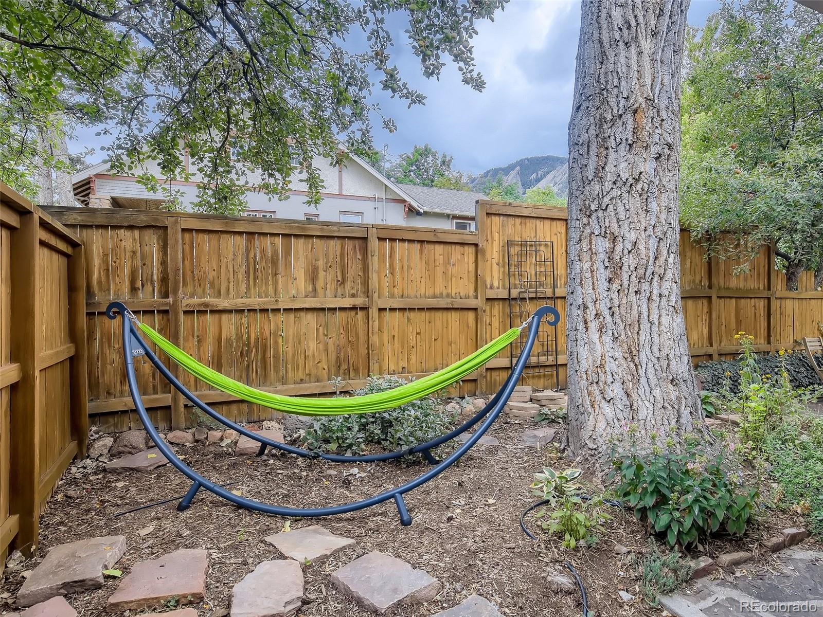 743 9th Street Boulder, CO 80302 - Photo 26 of 28 a view of a backyard with plants