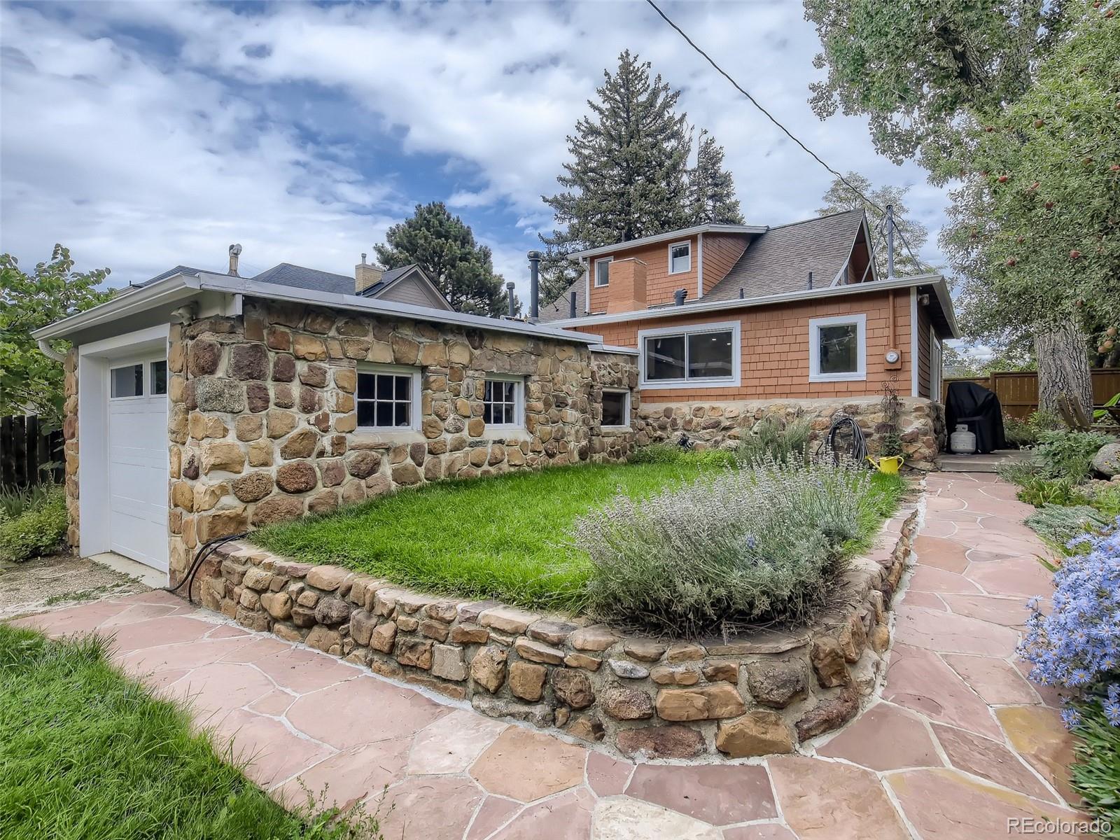 743 9th Street Boulder, CO 80302 - Photo 28 of 28 a front view of a house with garden