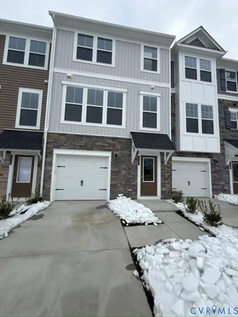 a front view of a building with many windows
