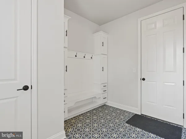 a big room with white walls