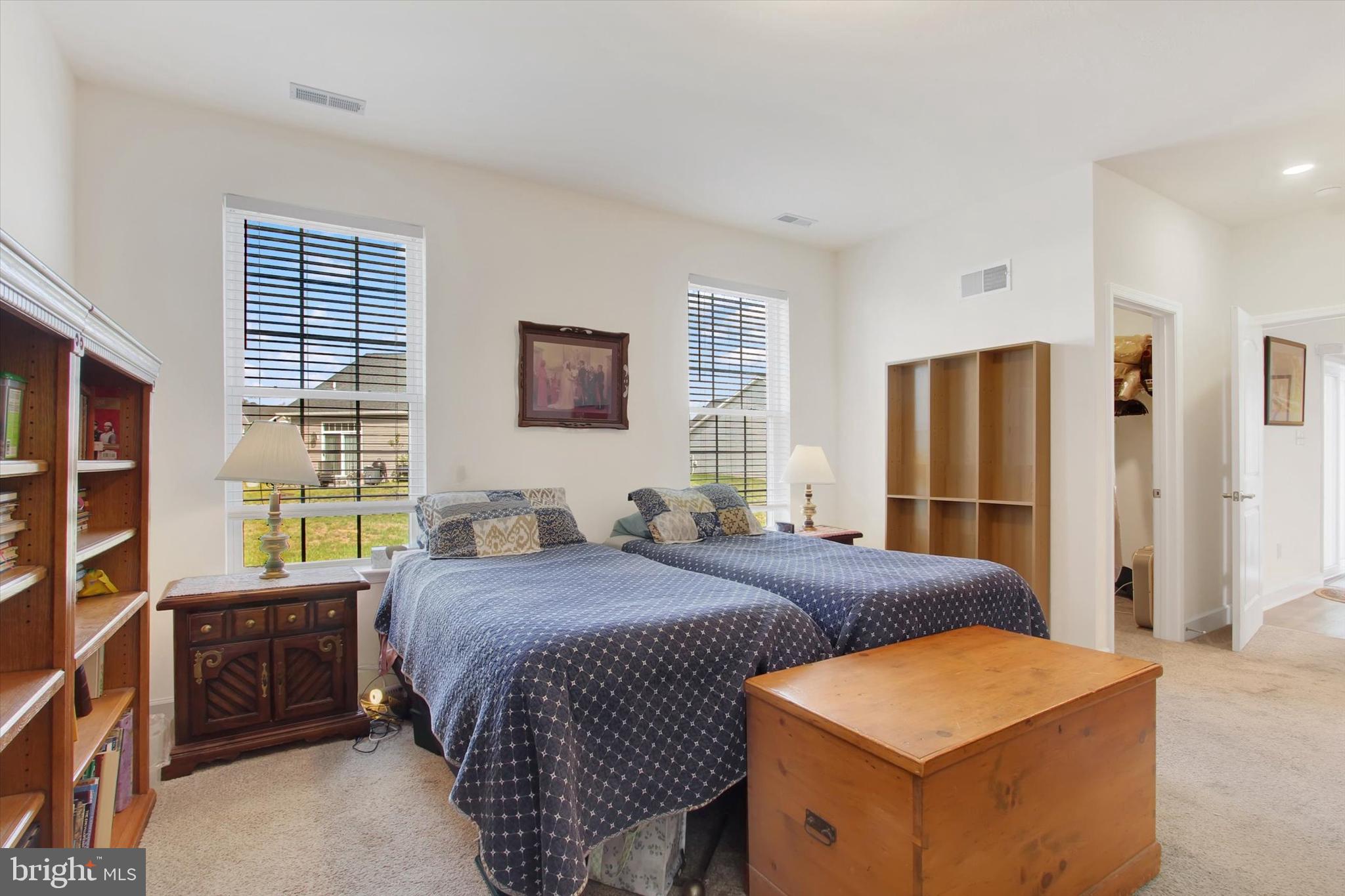 8 Osprey Court Gettysburg, PA 17325 - Photo 15 of 26 a bedroom with a bed and a dresser next to a window