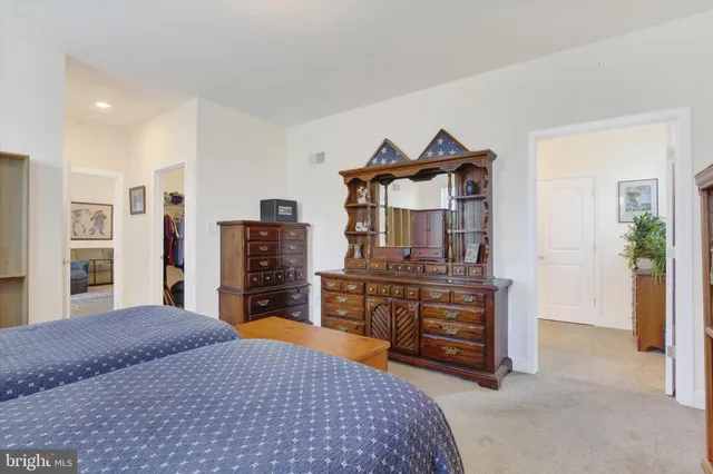 a bedroom with a bed and furniture