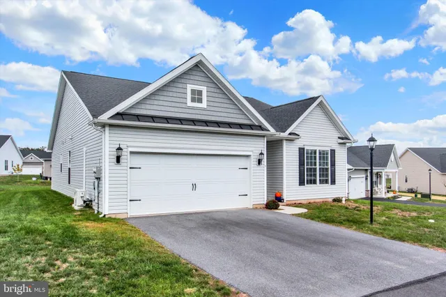 a front view of house with yard