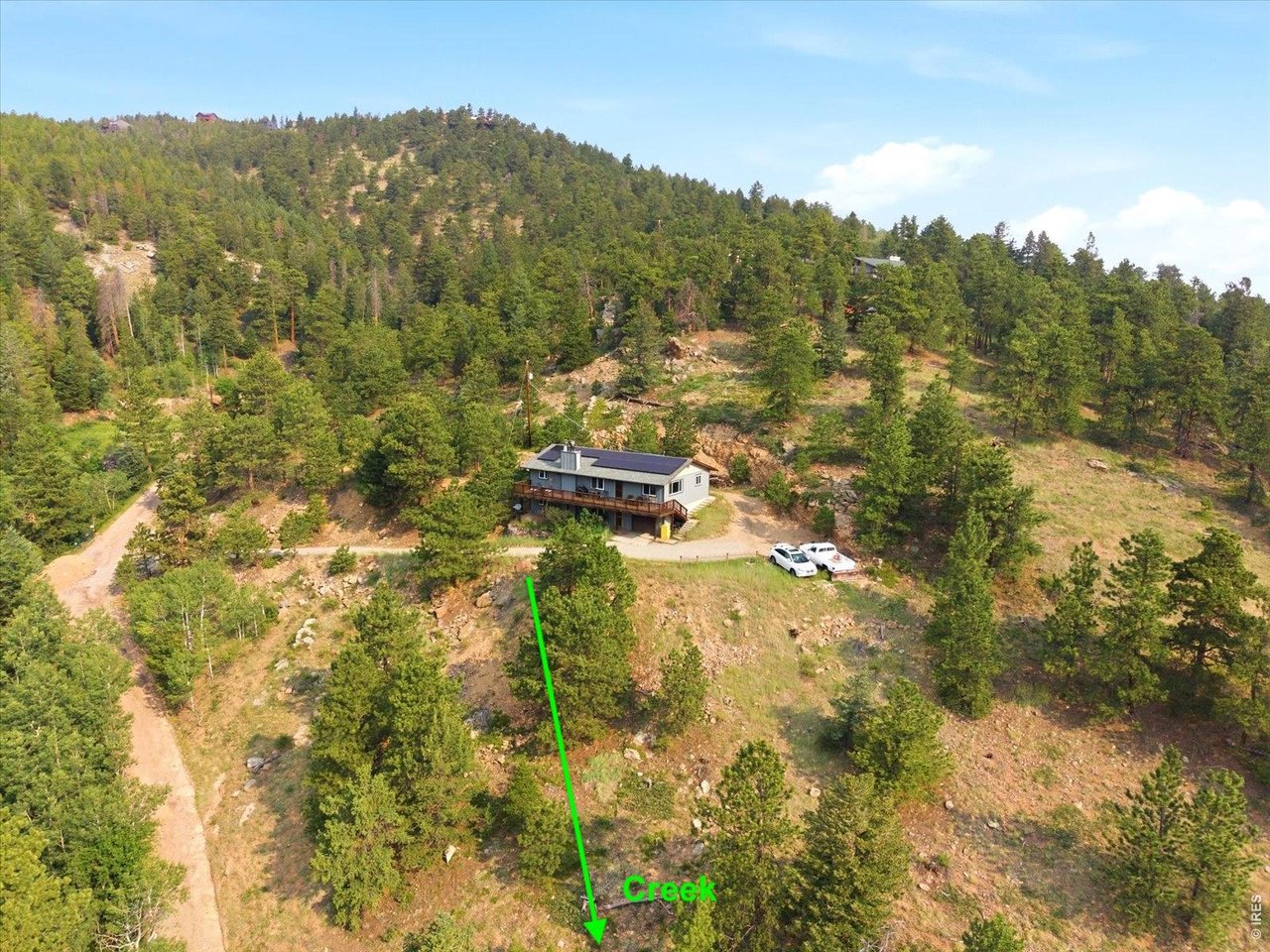 32307 Sylvan Road Golden, CO 80403 - Photo 3 of 39 South facing home and property extends to creek