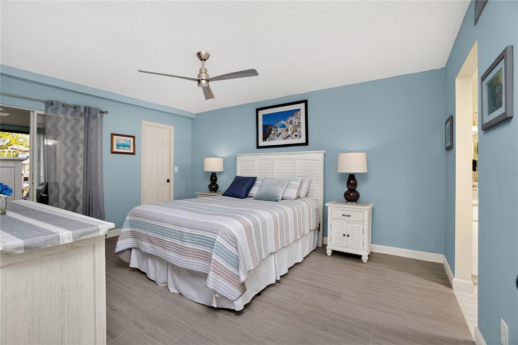 1501 Beach Road, Unit 210 Englewood, FL 34223 - Photo 21 of 62 a bedroom with bed and window