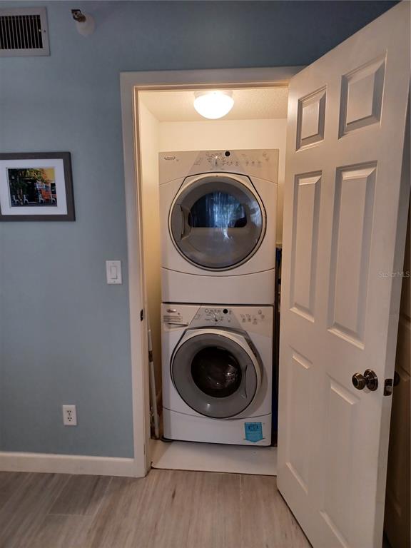 1501 Beach Road, Unit 210 Englewood, FL 34223 - Photo 23 of 62 a utility room with dryer and washer