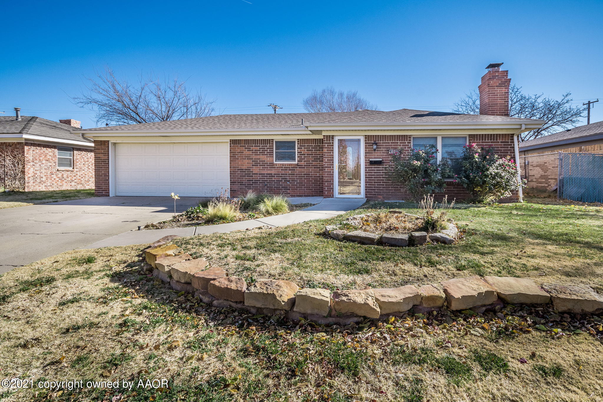 4809 South Rusk Street Amarillo, TX 79110 - Photo 1 of 17 a front view of a house with a yard and outdoor seating