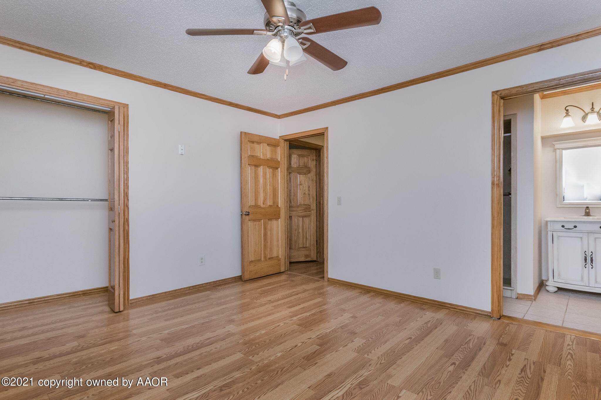 4809 South Rusk Street Amarillo, TX 79110 - Photo 11 of 17 a view of empty room with wooden floor