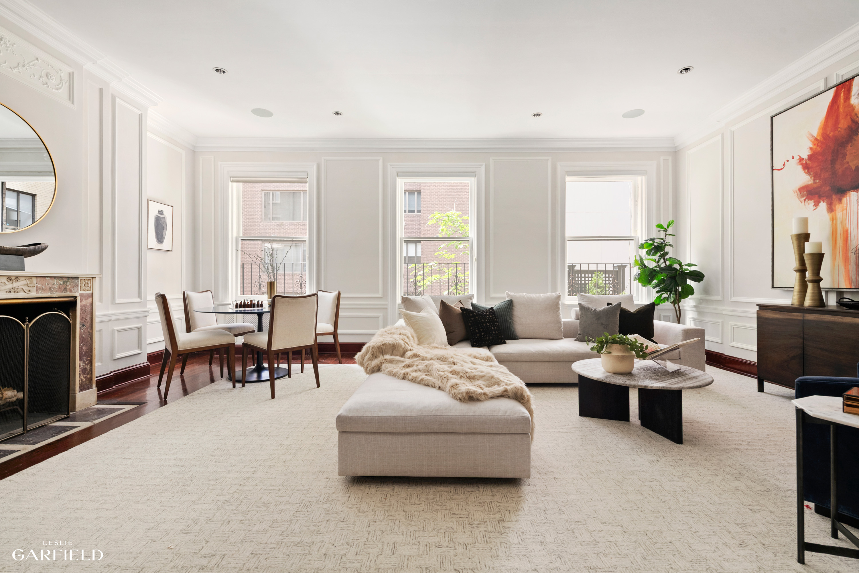 2 East 80th Street, Unit 7 Manhattan, NY 10075 - Photo 1 of 23 a living room with furniture and a fireplace