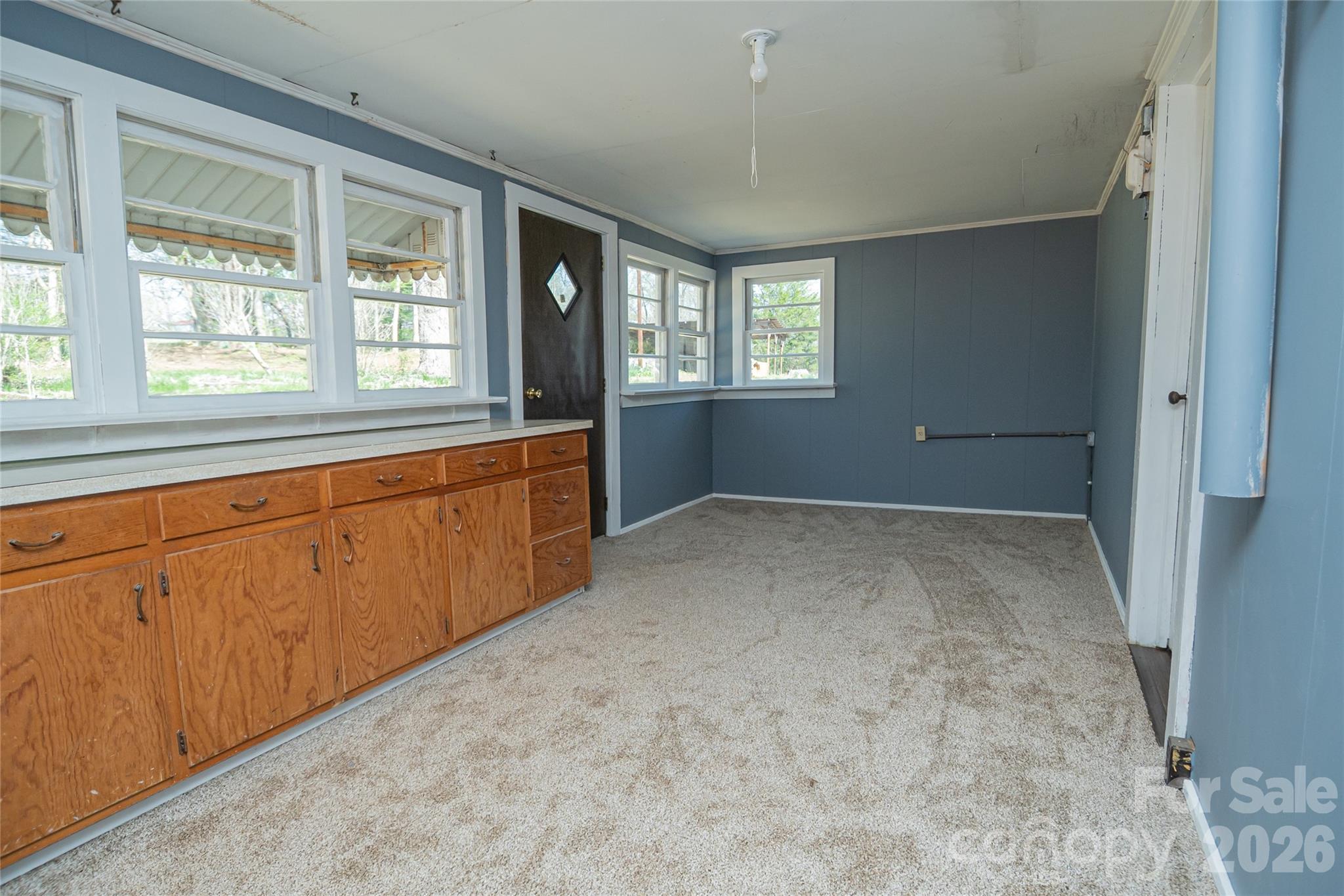 761 Amherst Road Morganton, NC 28655 - Photo 13 of 31 a view of an empty room with a window