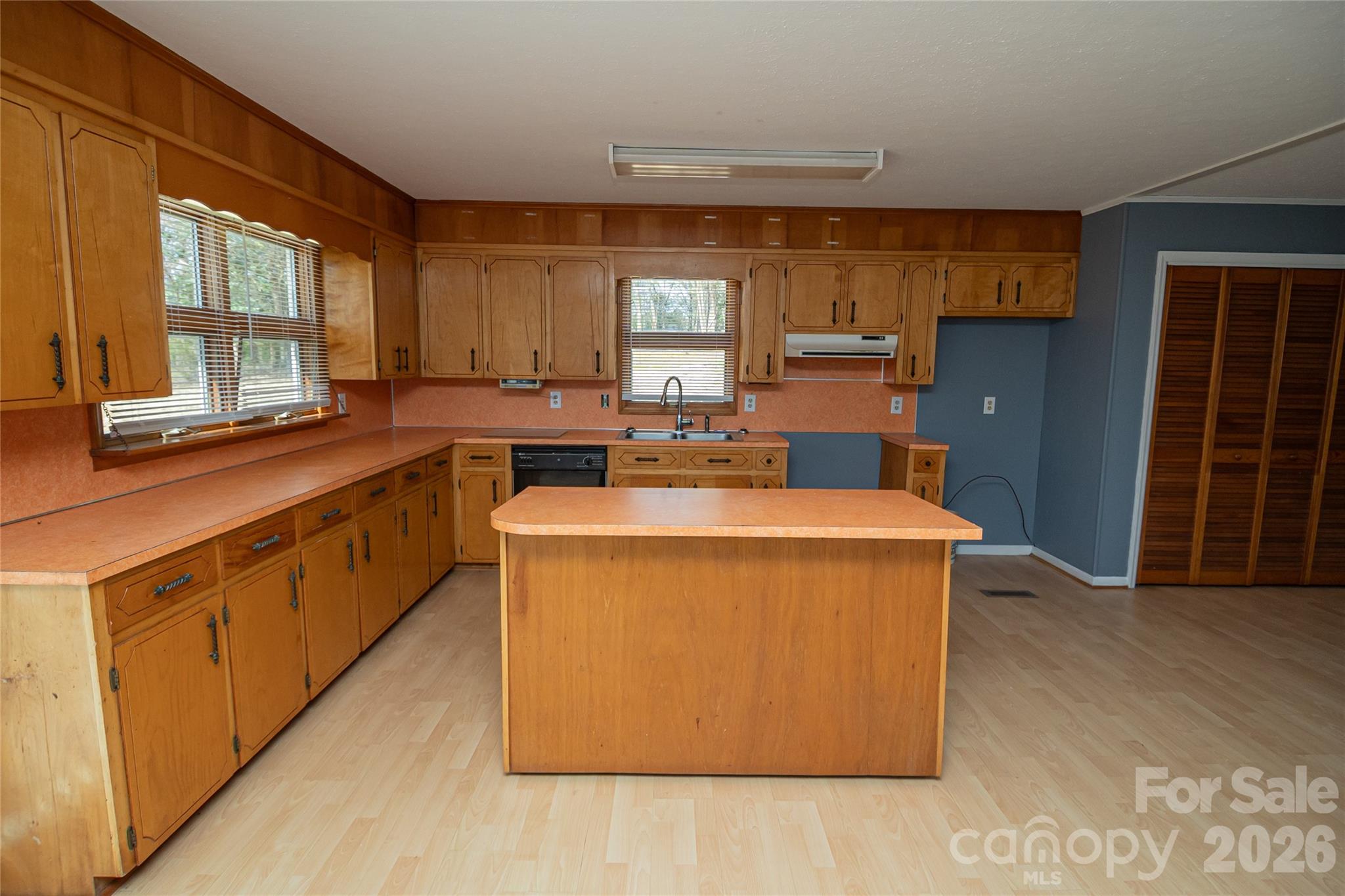 761 Amherst Road Morganton, NC 28655 - Photo 15 of 31 a kitchen with a stove a refrigerator and a oven